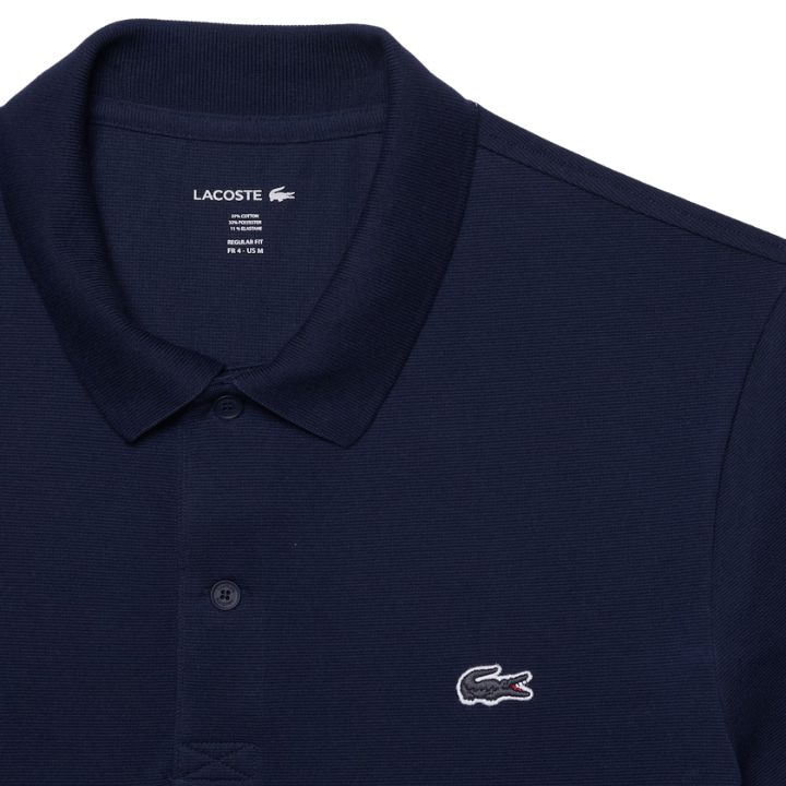 POLO LACOSTE - REGULAR FIT BLEU MARINE - Golf Passion